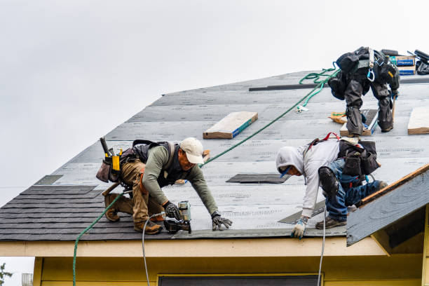 Professional Gutter Installation technician working in Mooreville, MS